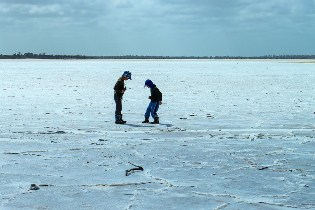 Two children at Lake Brown near Eaglestone Rock in the Wheatbelt