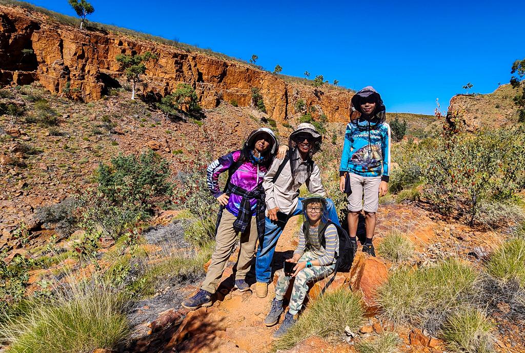 A family of 4 at Ormiston Gorge in West MacDonnell National Park